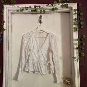 White long sleeve dress looking top